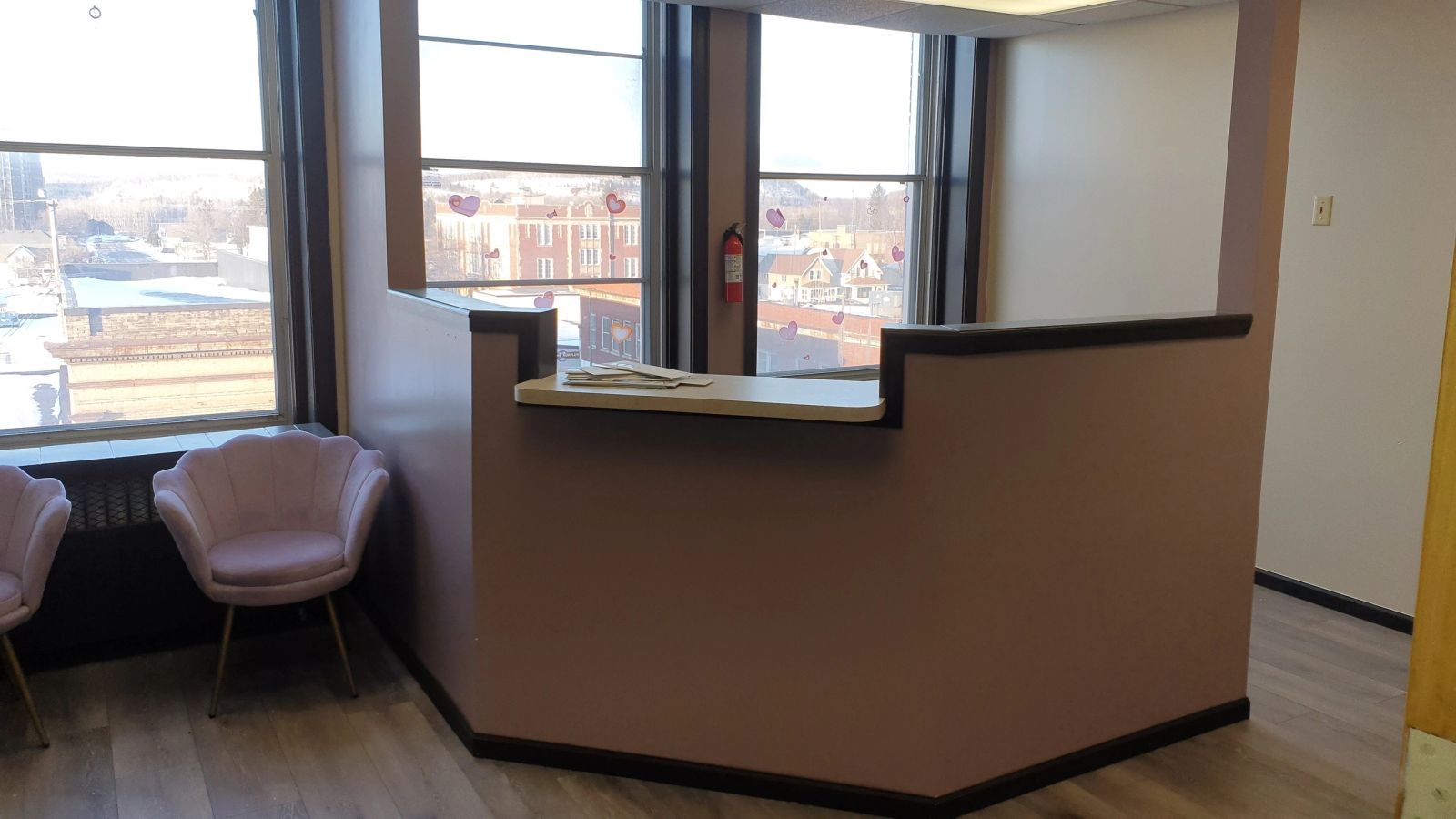 Office suite with reception counter and downtown views at 302 Chestnut